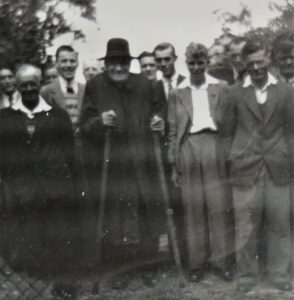 Rev Frederick Densham with funeral attendees