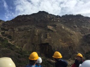 Recent RGSC Field trip members examine elvan rock