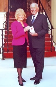 Richard and Bridget Larn collecting his OBE in 2009