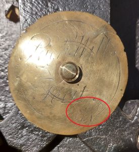 Part of clock workings showing the date made